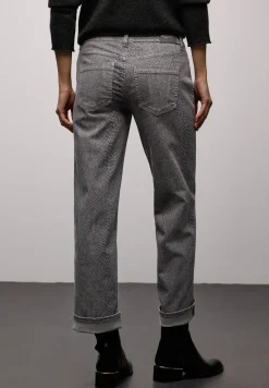 Jeans met slangenprint