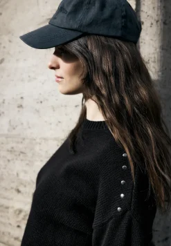 Jumper met klinknagels