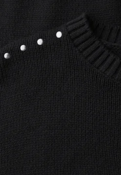 Jumper met klinknagels