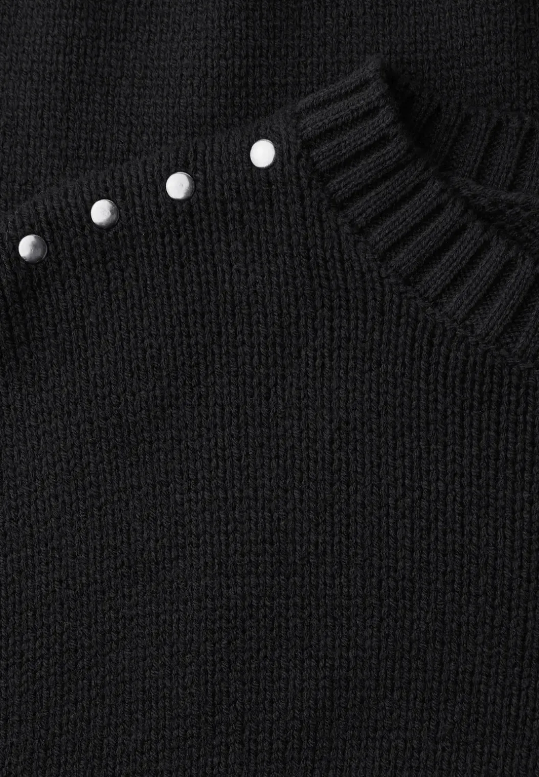 Jumper met klinknagels