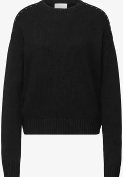 Jumper met klinknagels