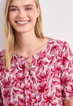 Knielange jurk met gespleten hals en print