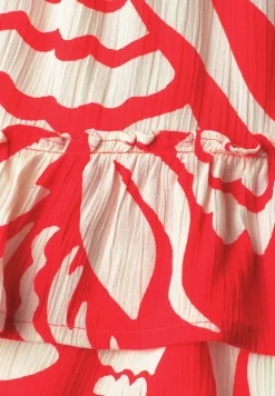 Knielange rok met bloemenpatroon