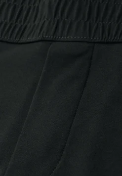 Mid Waist Slim Legs broek in Loose Fit