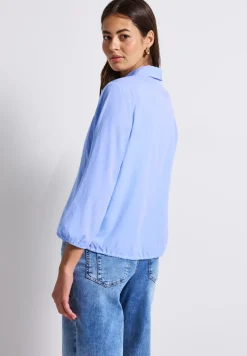 Overhemdblouse met glitterdetails