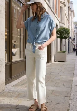Overhemdblouse met knopen en knoopdetail