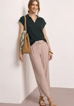 Poloshirt met losse schouders in een gebreide look