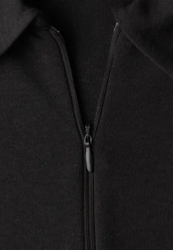 Poloshirt met rits