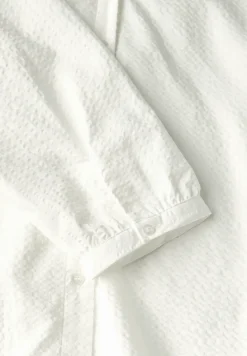 Seersucker blouse met gespleten hals