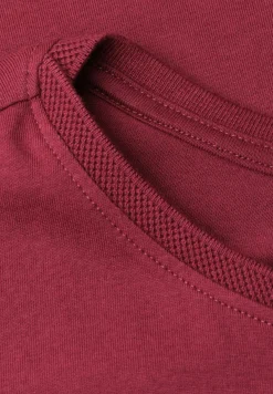 Shirt met boothals en decoratief detail