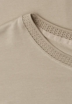 Shirt met boothals en decoratieve tape