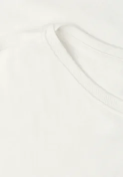 Shirt met boothals en decoratief detail