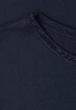 Shirt met boothals en decoratief detail