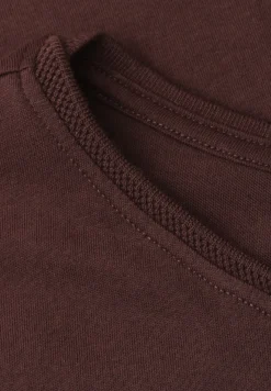 Shirt met boothals en decoratief detail