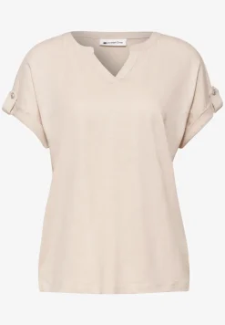 Shirt met gespleten hals en knoopdetails