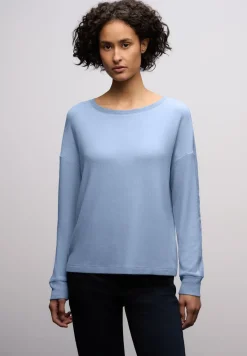 Shirt met glitterdetails