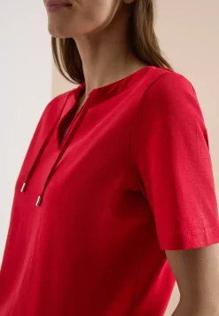 Shirt met korte mouwen en gespleten hals