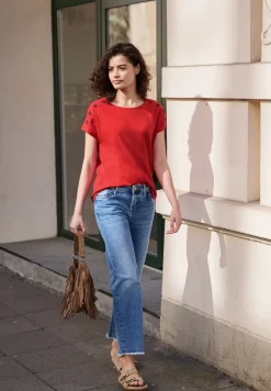 Shirt met overhangende schouder en knoopdetail