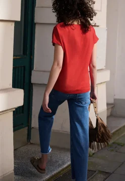 Shirt met overhangende schouder en knoopdetail
