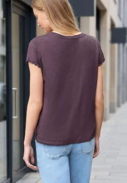 Shirt met overhangende schouder en decoratieve tape