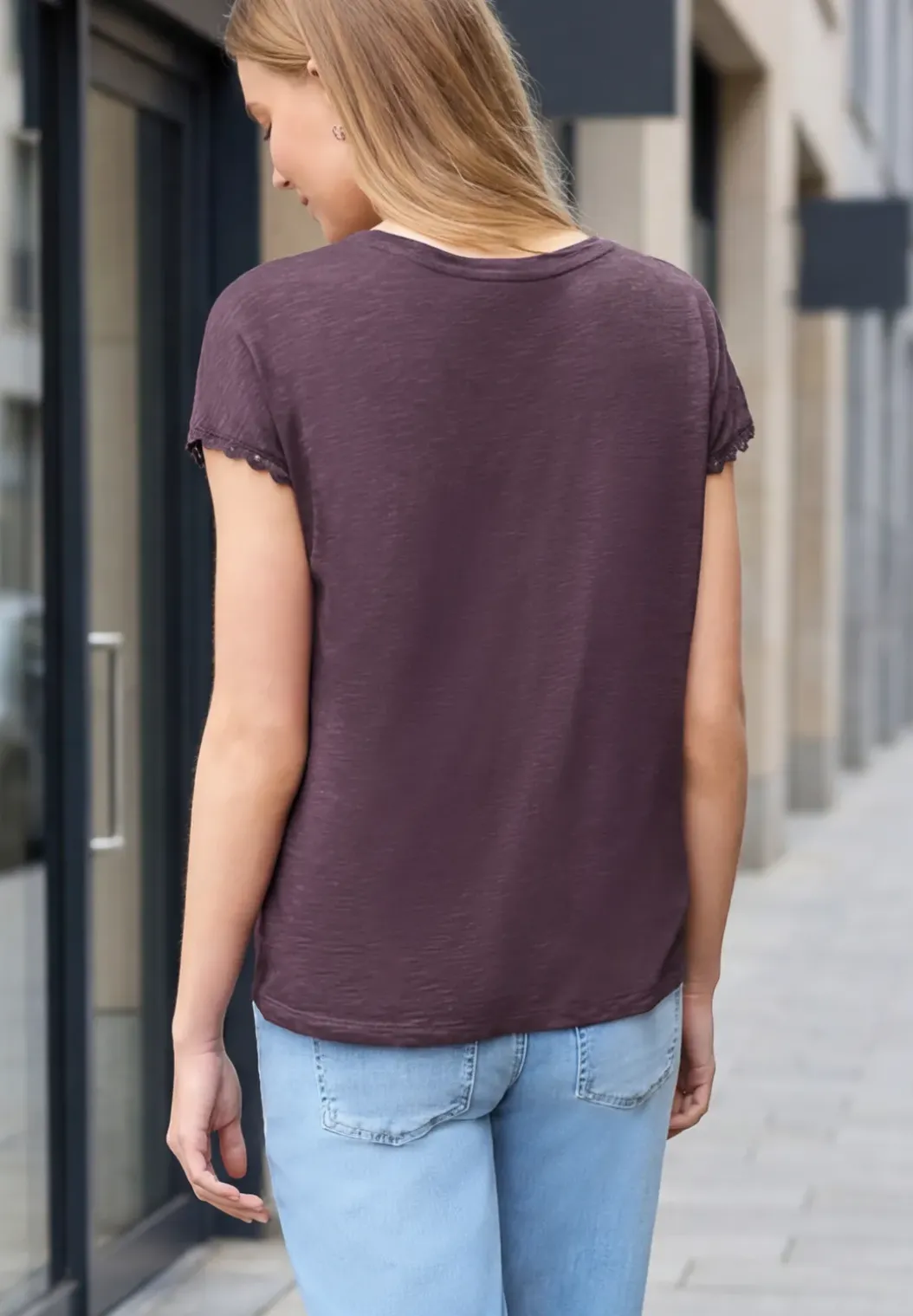 Shirt met overhangende schouder en decoratieve tape