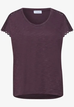 Shirt met overhangende schouder en decoratieve tape