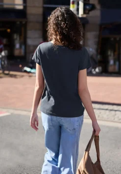 Shirt met overhangende schouder en knoopdetail