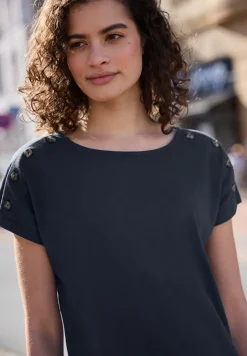 Shirt met overhangende schouder en knoopdetail