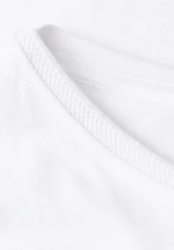 Shirt met boothals en decoratief detail