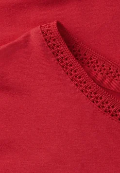 Shirt met decoratieve tape