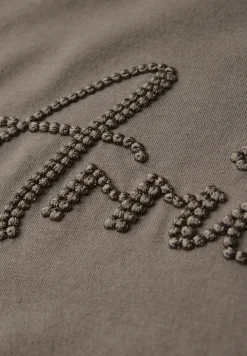 Shirt met tekstborduring