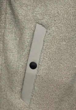 Softshell jas met teddy details
