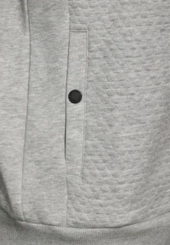 Sweatjack met materiaalmix