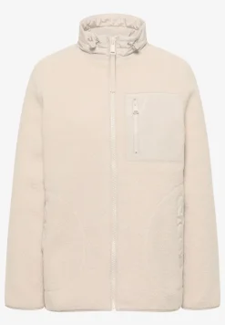 Teddy jas met details
