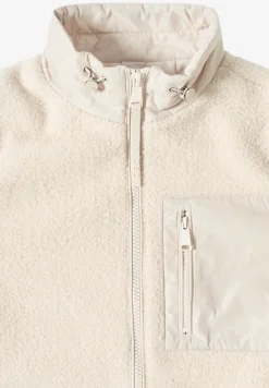Teddy jas met details