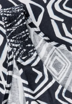 Top met gesmokte details
