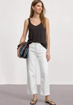 Top met V-hals en knoopdetail