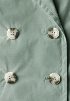 Trenchcoat met twee rijen knopen