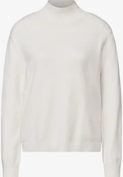 Trui met knoopdetail