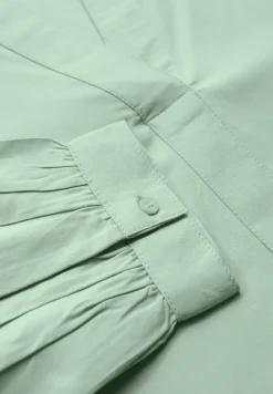 Tuniek met gespleten hals