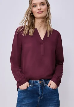 Tuniek met gespleten hals
