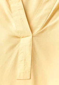 Tuniek met gespleten hals