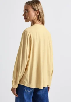 Tuniek met gespleten hals
