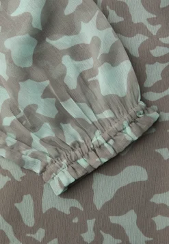 Tuniek met ruches