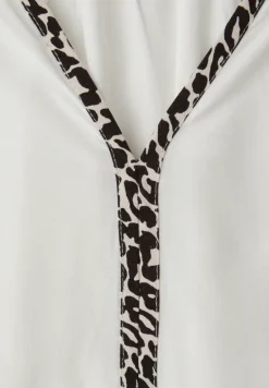 Tuniek met tapedetails